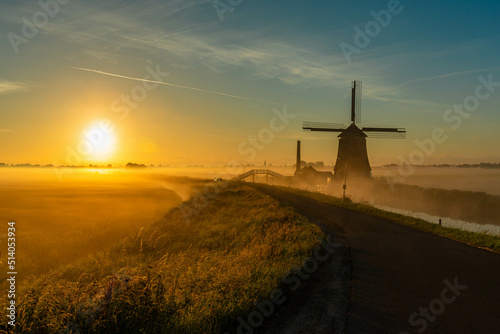 windmill in the fog photo