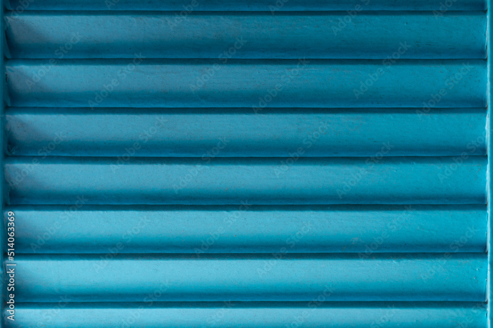 Obraz premium Old blue painted wooden window shutter