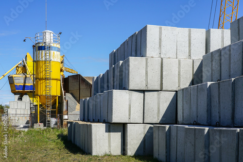 Many large white concrete cube shaped blocks in the factory yard