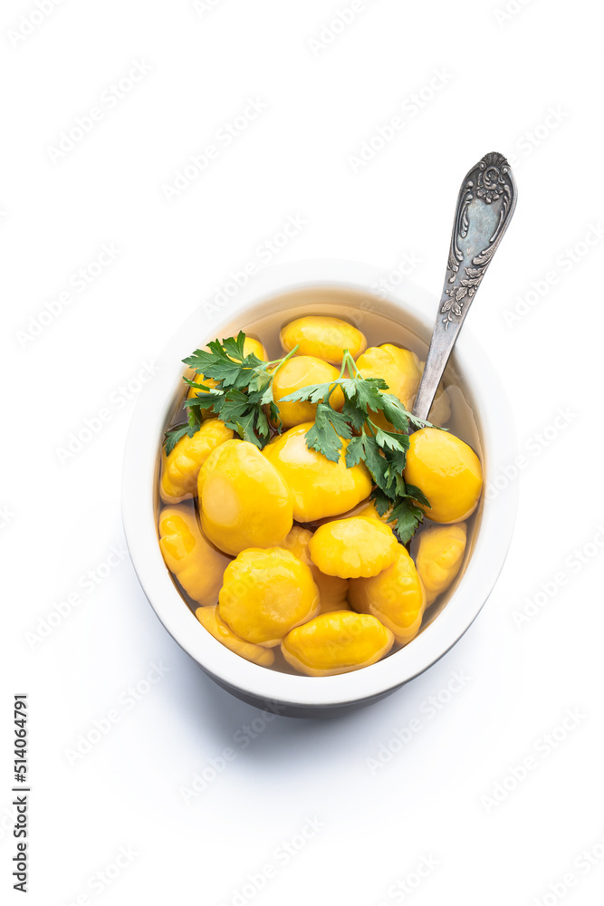 Marinated yellow squash in ceramic bowl isolated on white Marinated yellow squash in ceramic bowl isolated on white