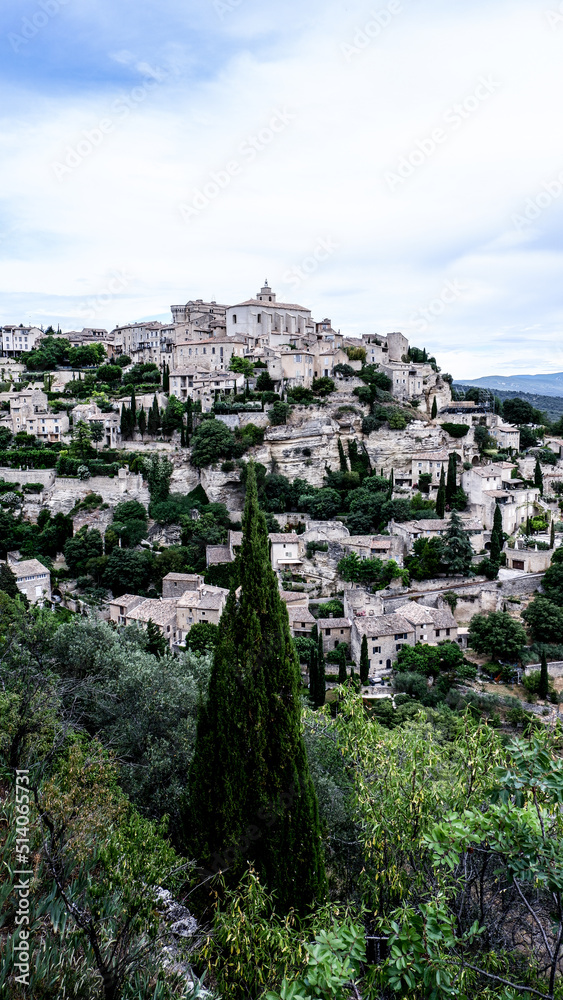 Beautiful city of Gordes perched atop a hillside in the Provence countryside of France