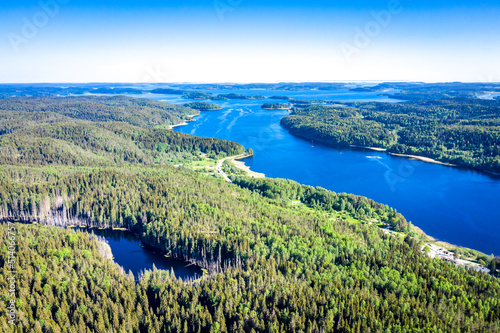 Aerial view on Ladoga lake. Ladoga Lake in Karelia in summer. Blue lake and green forest top view