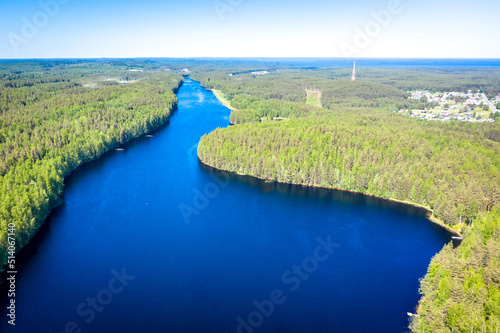 Aerial view on Suna river and Vikshozero lake in Girvas. Lake in Karelia in summer. Blue lake and green forest top view