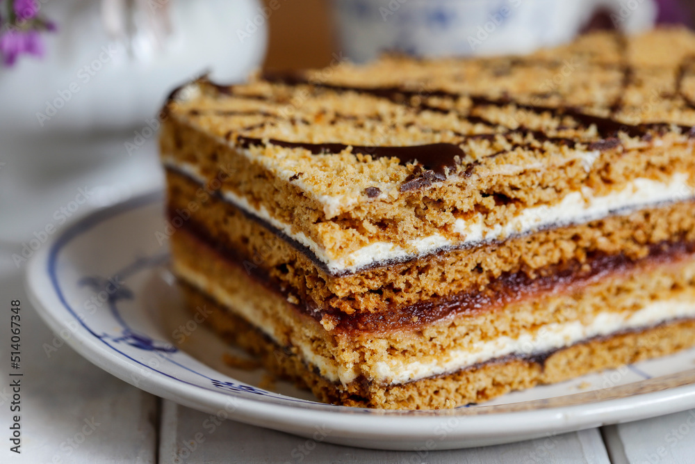 Homemade honey layer cake on the table. Homemade honey layer cake on the table.