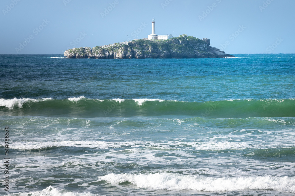 Mouro lighthouse from El Puntal beach, bay of Santander, Spain