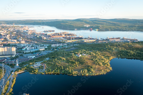 Fototapeta Naklejka Na Ścianę i Meble -  Aerial view of Murmansk in the summer. City beyond the Arctic Circle. Polar day