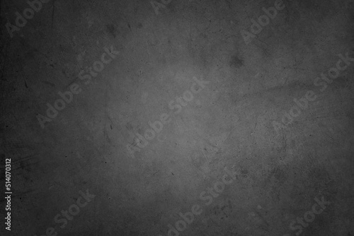 Close-up of abstract grey concrete wall texture background. Dark edges 