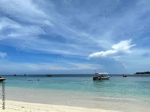 Landscape view of clear sky with calm sea water © Naufal Wibisono