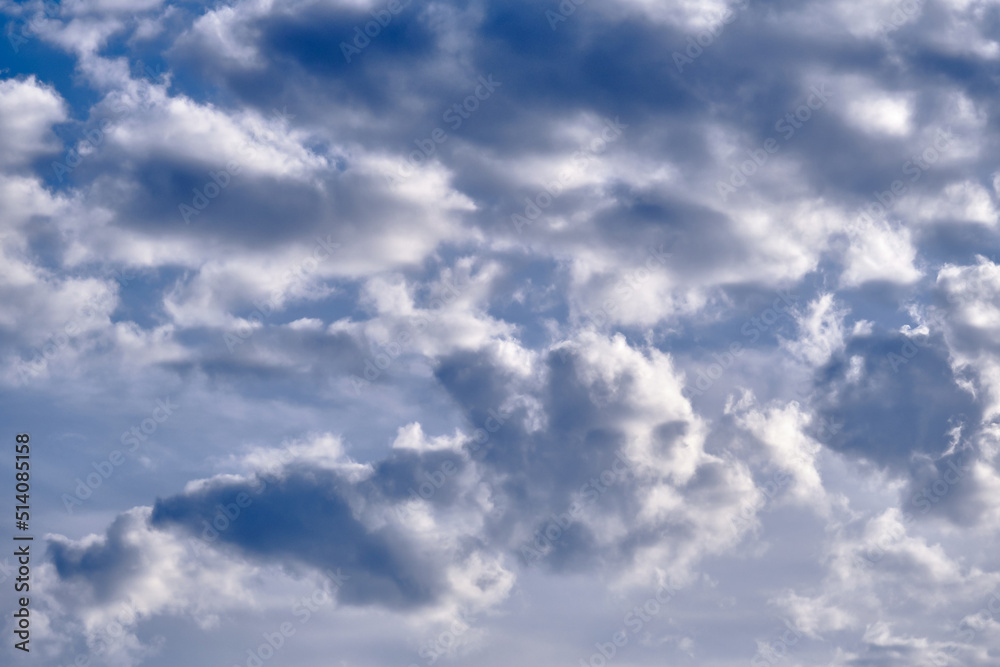 Blue sky with clouds. Heaven on a summer day.