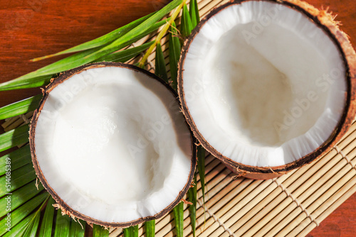 Dry and white coconut sliced ​​in half