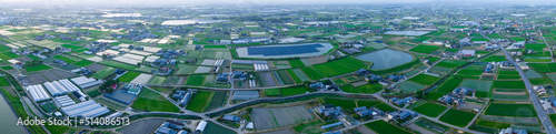 Aerial panorama: Rice fields and water storage ponds in countryside