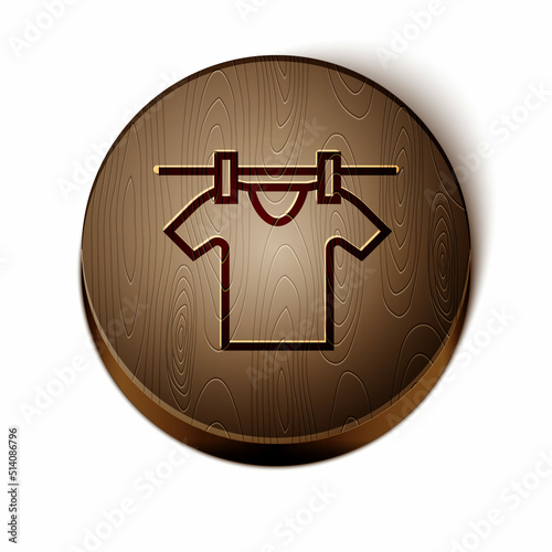 Brown line Drying clothes icon isolated on white background. Clean shirt. Wash clothes on a rope with clothespins. Clothing care and tidiness. Wooden circle button. Vector