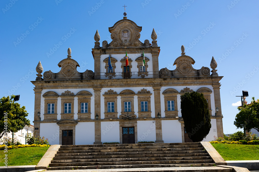 Obraz premium View of the City Hall building, the Parish Church of Our Lady of Incarnation and the statue to Pope John Paul II. Portugal