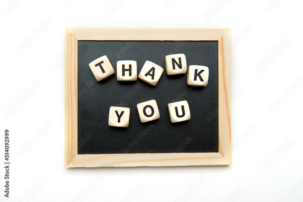 Top view of wooden cubes with thank you inscription