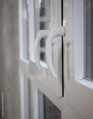 White minimalist door handle. Door handle
