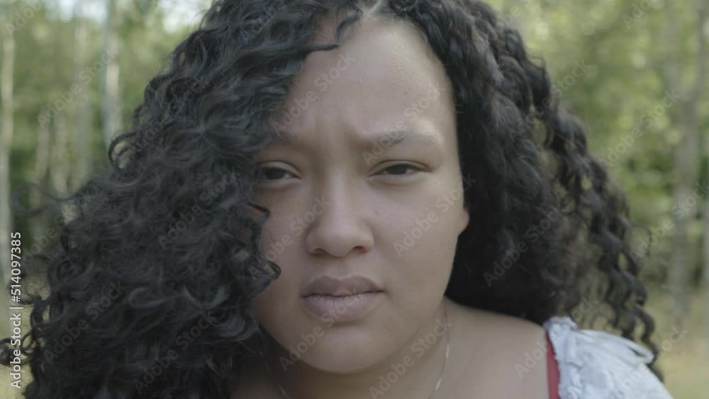 Angry looking gorgeous black woman.