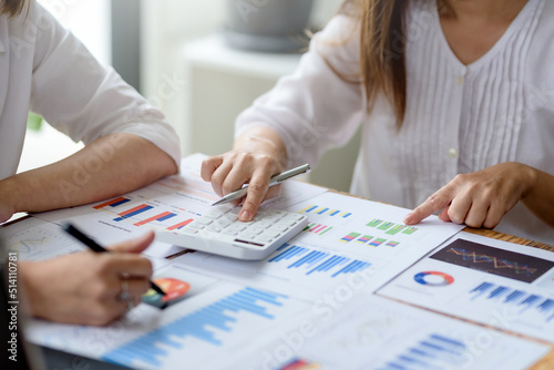 Two of business woman at meeting assessment the state of business investment and marketing in office.