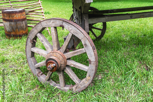 Old wooden cartwheel close-up. Rural vintage vehicle