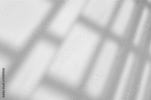 Gray shadow and light blur abstract background on white wall from window. Architecture stripe dark shadows indoor in room background, monochrome, shadow overlay effect