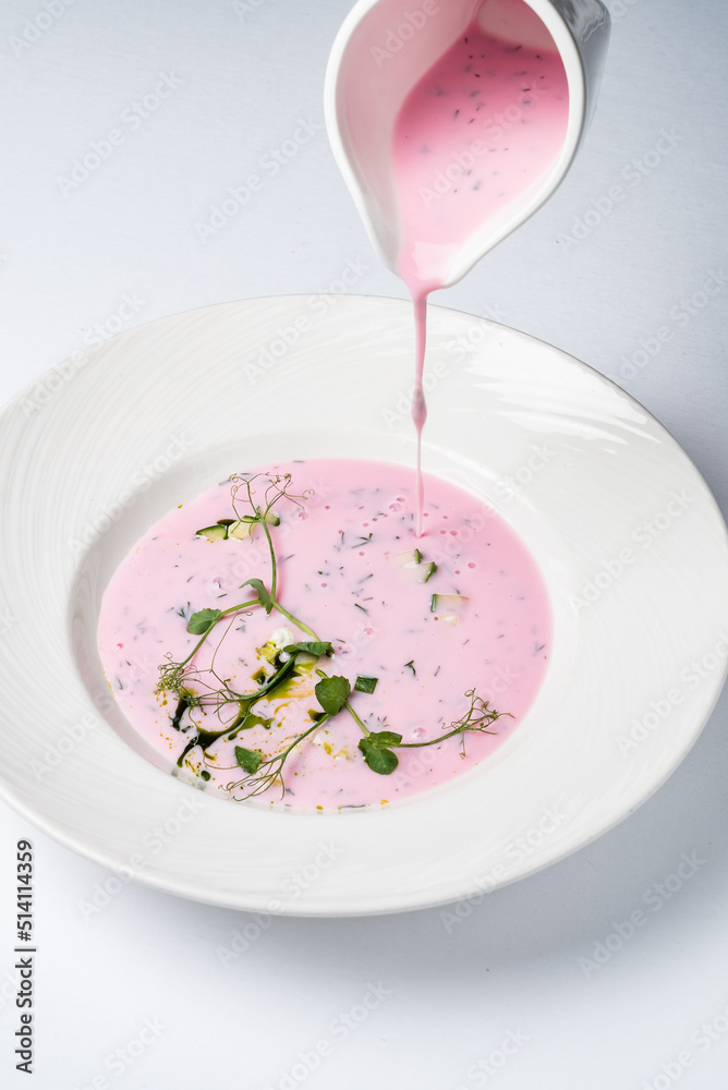 cold beetroot soup on the white background cold beetroot soup on the white background