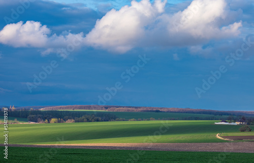 Clouds moving across the sky over rural fields in Ukraine