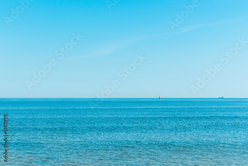 Beautiful morning skyline blue sky,water, sea, ocean. Calm, cool, relaxing water. cold background,copy space.
