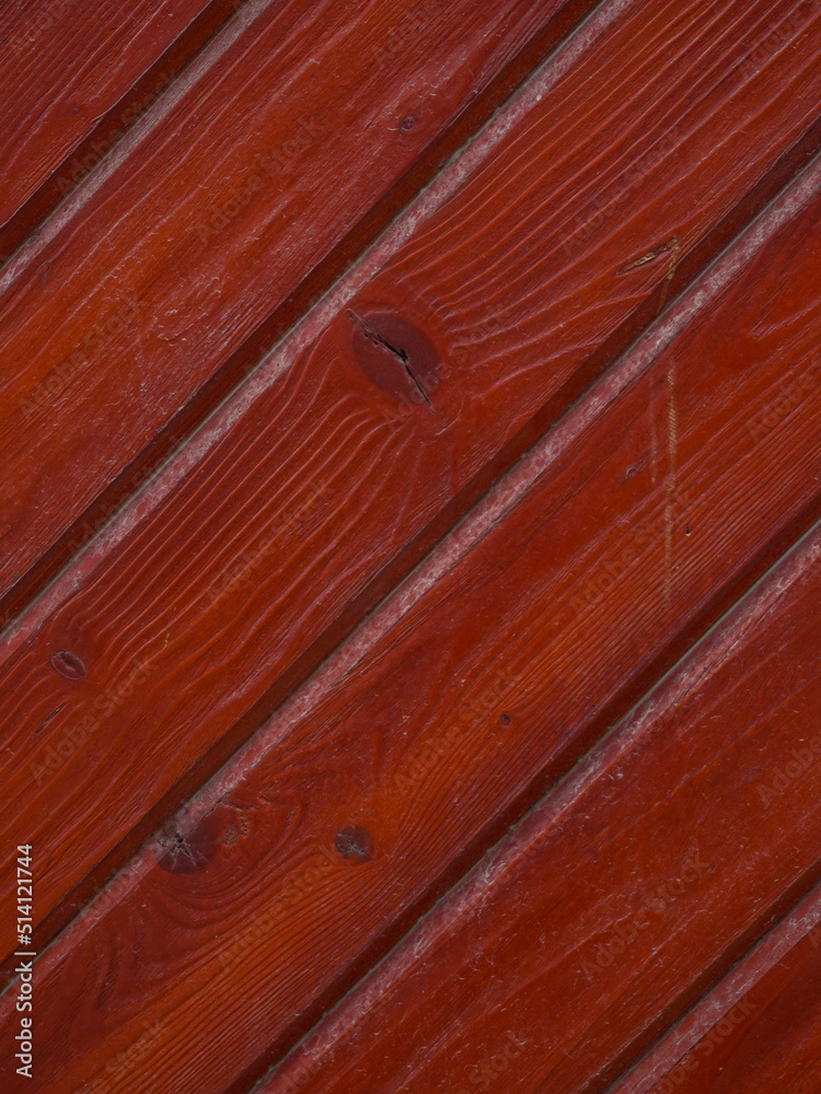 Vertical image of old boards with red paint. Wood texture background nature background wallpaper vintage retro old style decor design popular. A wooden door. Vertical image of old boards with red paint. Wood texture background nature background wallpaper vintage retro old style decor design popular. A wooden door.