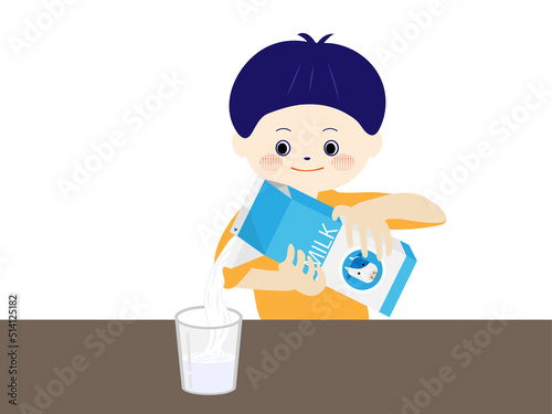 牛乳をコップに注ぐ子ども