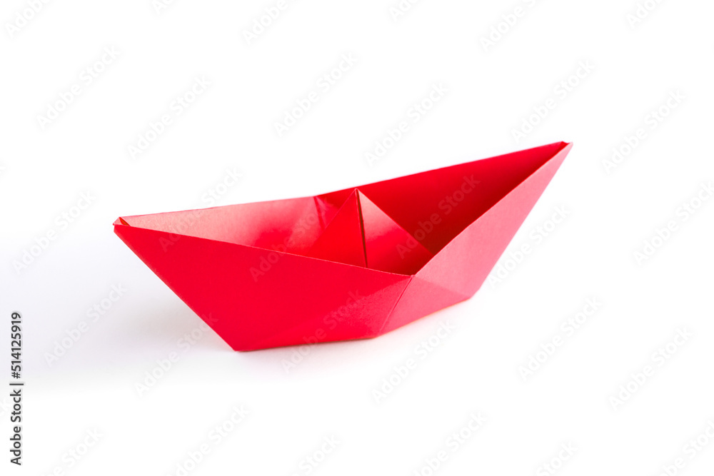 Red paper boat origami isolated on a white background Red paper boat origami isolated on a white background