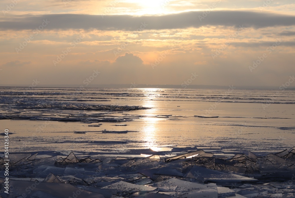 sunset over floating ice floes