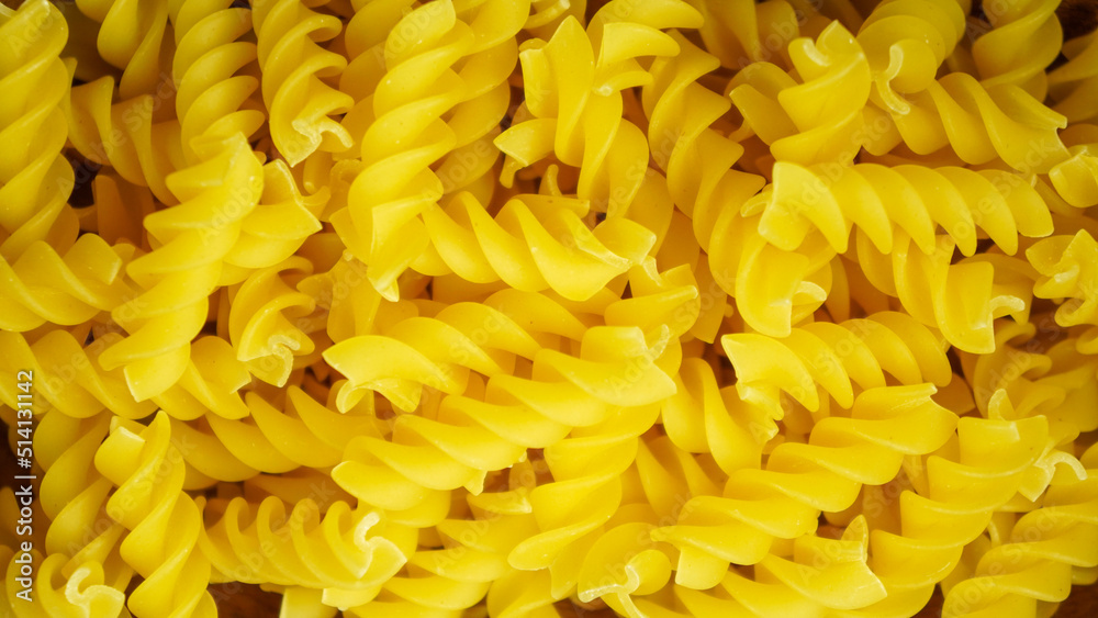 pasta in a dish dry appetizing spiral macaroni in the kitchen food preparation pasta in a dish dry appetizing spiral macaroni in the kitchen food preparation