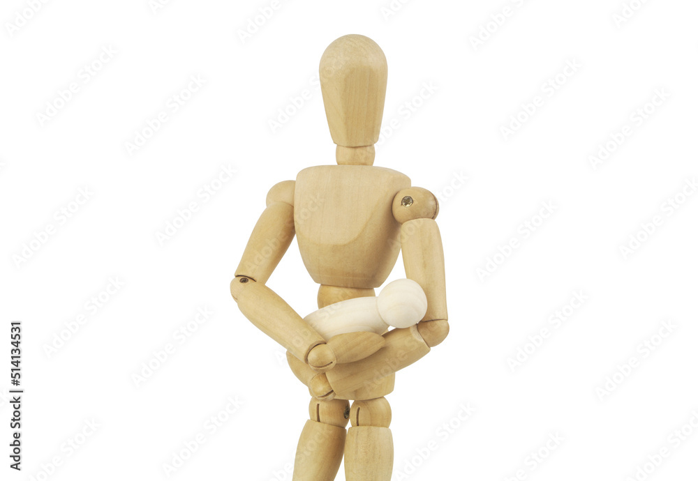 Parenthood and newborn concept. Wooden figurine holding small baby figure isolated on white background. Parenthood and newborn concept. Wooden figurine holding small baby figure isolated on white background.