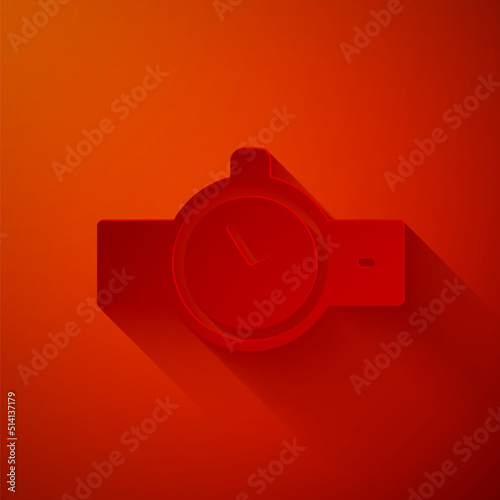 Paper cut Wrist watch icon isolated on red background. Wristwatch icon. Paper art style. Vector