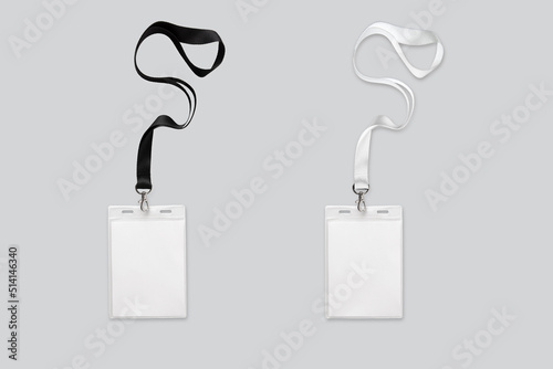 Two ID card holder with black and white colored lanyard mockup isolated on white background. 3d rendering. photo