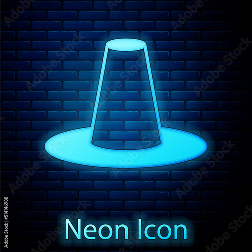 Glowing neon Traditional korean hat icon isolated on brick wall background. Vector