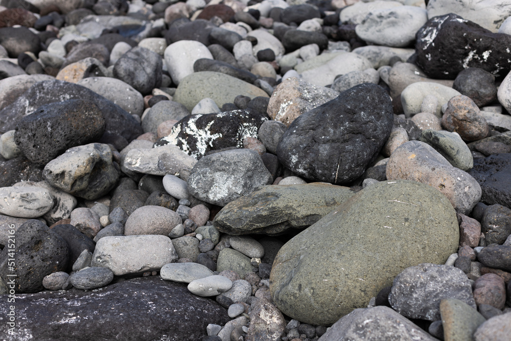 Texture of the seashore with big and small stones. Natural background. Texture of the seashore with big and small stones. Natural background.