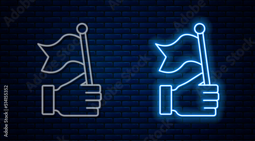 Glowing neon line Hand holding flag icon isolated on brick wall background. Victory, winning and conquer adversity concept. Vector