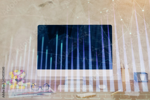 Forex graph hologram on table with computer background. Double exposure. Concept of financial markets.