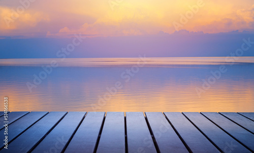 Art summer calm background; sunset seascape and art beautiful wooden deck;