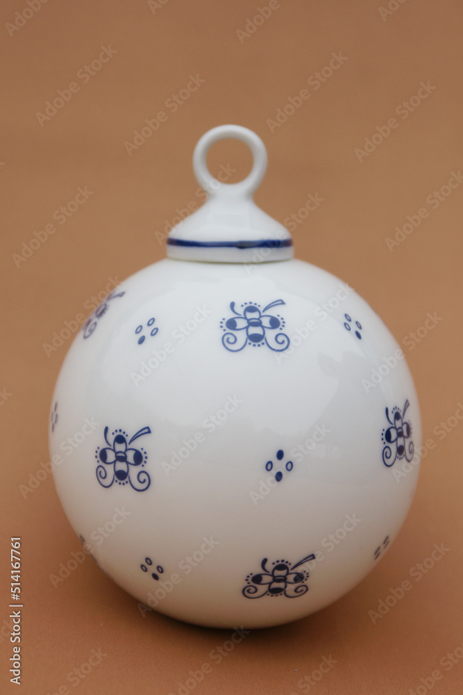 Porcelain globe for decorating the Christmas tree. Winter Holiday and Xmas ornament. Porcelain globe for decorating the Christmas tree. Winter Holiday and Xmas ornament.