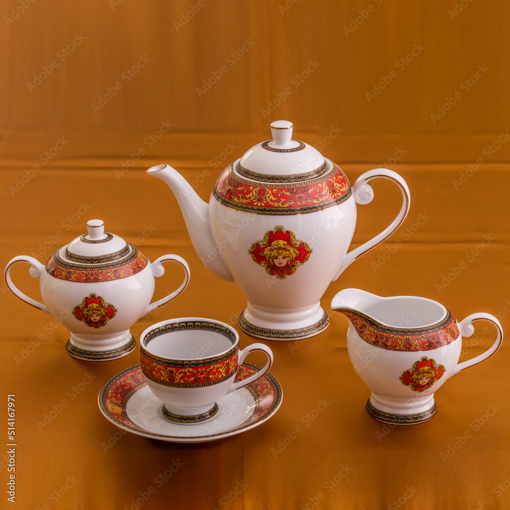 Beautiful bone-china tea set with tea pot and cups and saucers Elegant ...