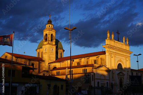 Church of San Giovanni Battista, the main church of the town. San Giovanni Lupatoto. Place of worship illuminated by the setting sun. Christian life in Veneto.