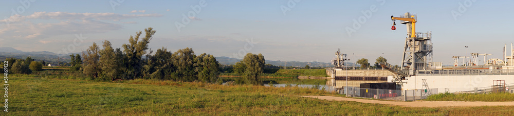 Huge dam on a river in the countryside. Huge dam on a river in the countryside.