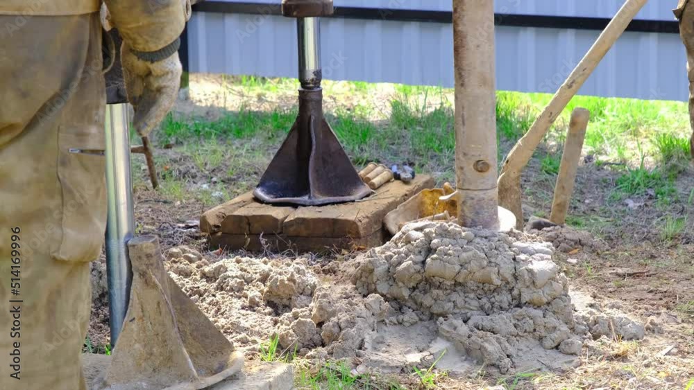 Stockvideo Team of workers with drilling rig on car are drilling