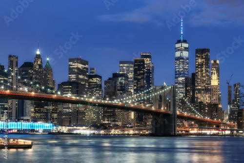 Manhattan skyline at night and Brooklyn bridge in New York City  © lucky-photo