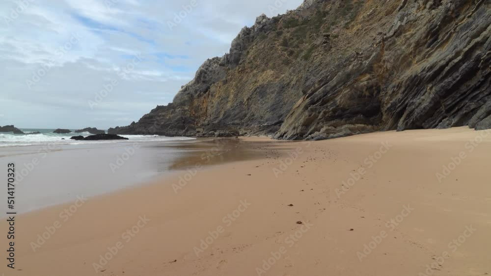 Majestic Wild Beach Near Gruta da Adraga Mountain in Portugal Majestic Wild Beach Near Gruta da Adraga Mountain in Portugal