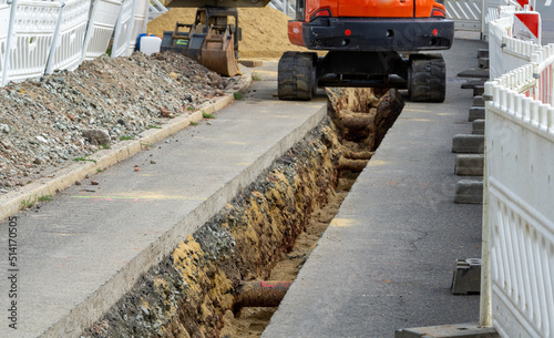 Construction site digging gas pipeline excavator