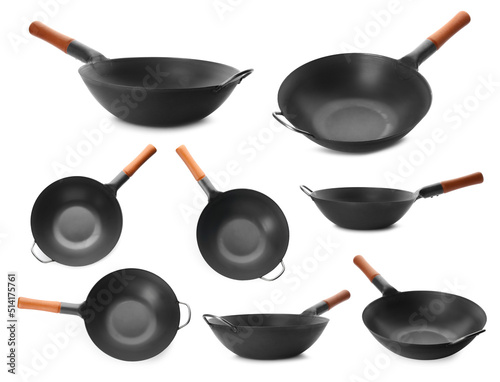 Set with empty woks on white background