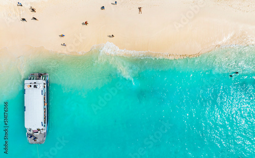 Summer tropical view with white sand beach and wave water energy with a summer tropical background , Top view