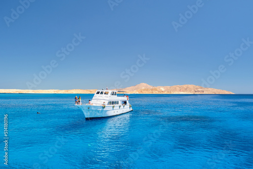 Yacht in the sea with clear water. The concept of leisure and travel © Ihar